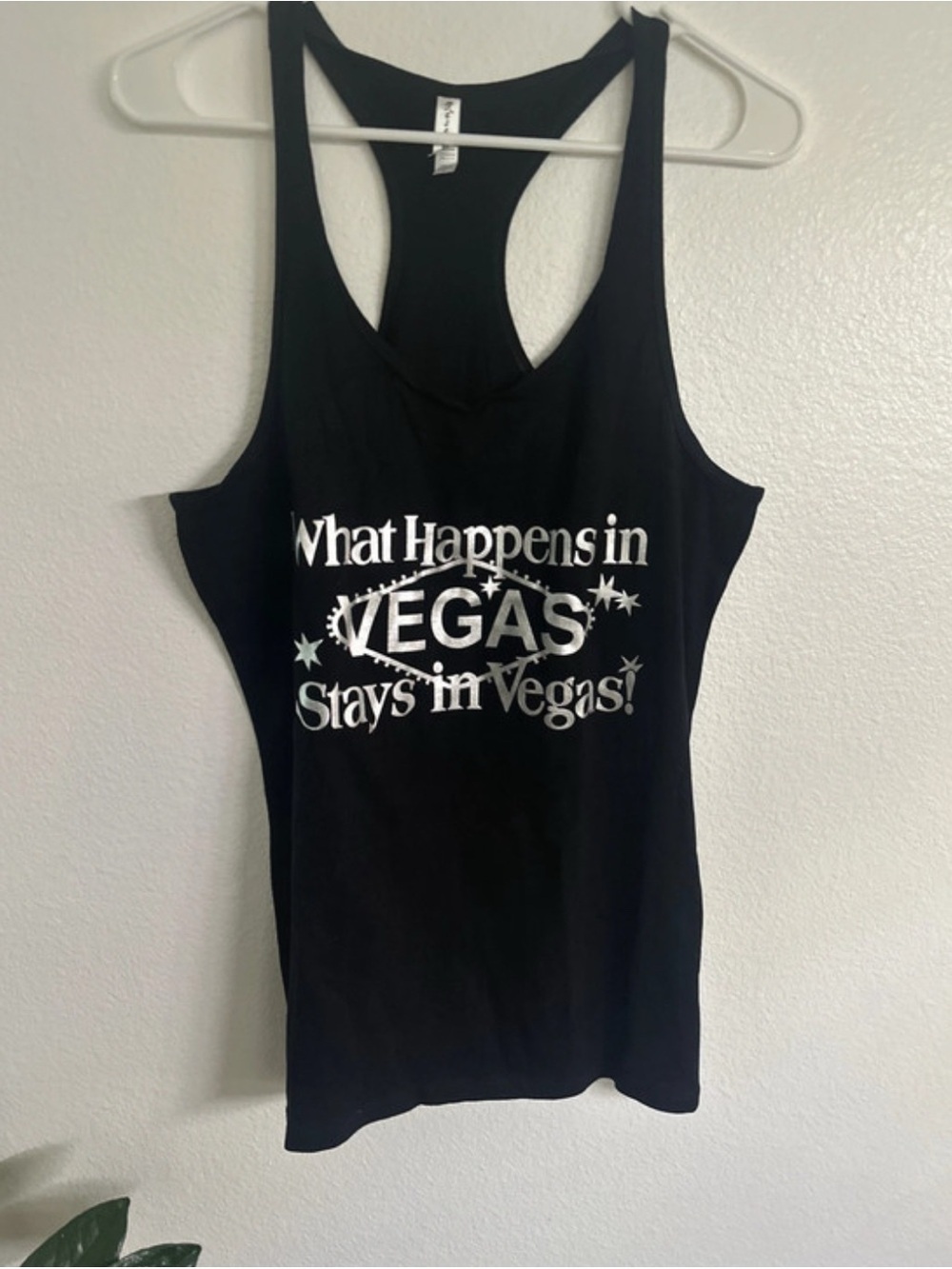 NWOT-XL Black Graphic Racerback Tank Top
What happens in Vegas stays in Vegas